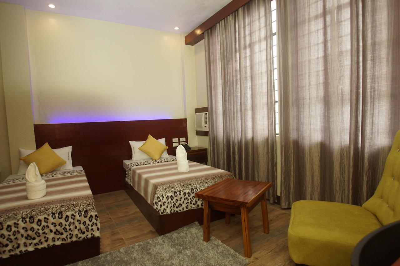 Hacasi Hotel Anibong Exterior foto